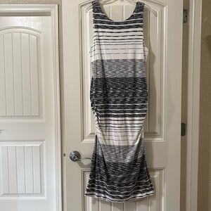 Athleta XL body con dress.Black and white. Side ruching adds to the flatter!